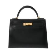 Pre-owned Leather handbags Hermès Vintage , Black , Dames