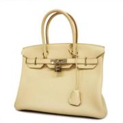 Pre-owned Leather handbags Hermès Vintage , Beige , Dames