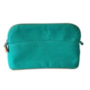 Pre-owned Leather pouches Hermès Vintage , Green , Dames