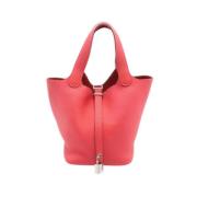 Pre-owned Leather handbags Hermès Vintage , Red , Dames