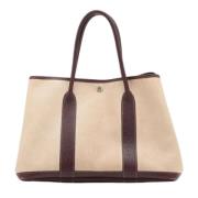 Pre-owned Leather handbags Hermès Vintage , Beige , Dames