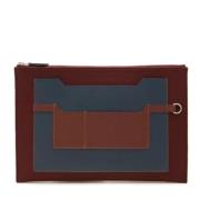 Pre-owned Leather clutches Hermès Vintage , Blue , Dames