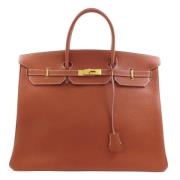 Pre-owned Leather handbags Hermès Vintage , Brown , Dames