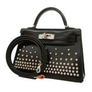 Pre-owned Leather handbags Hermès Vintage , Black , Dames