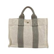 Pre-owned Canvas handbags Hermès Vintage , Beige , Dames