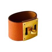 Pre-owned Leather bracelets Hermès Vintage , Orange , Dames