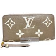 Pre-owned Fabric wallets Louis Vuitton Vintage , Beige , Dames