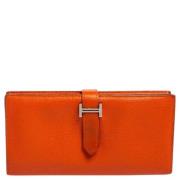 Pre-owned Leather wallets Hermès Vintage , Orange , Dames