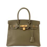 Pre-owned Canvas handbags Hermès Vintage , Green , Dames