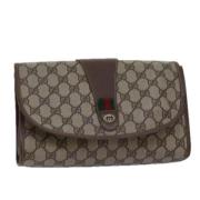 Pre-owned Leather clutches Gucci Vintage , Beige , Dames