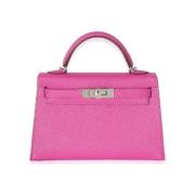 Pre-owned Leather handbags Hermès Vintage , Pink , Dames