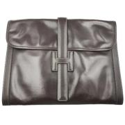 Pre-owned Canvas clutches Hermès Vintage , Brown , Dames