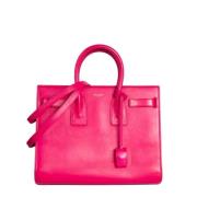 Pre-owned Leather handbags Yves Saint Laurent Vintage , Pink , Dames