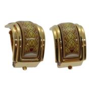 Pre-owned Metal earrings Hermès Vintage , Yellow , Dames