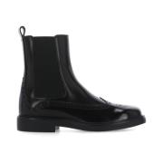 Zwarte Leren Enkellaarzen met Elastische Banden Tod's , Black , Dames