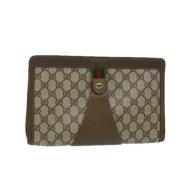 Pre-owned Leather clutches Gucci Vintage , Beige , Dames