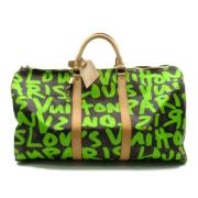 Pre-owned Canvas handbags Louis Vuitton Vintage , Green , Dames