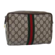 Pre-owned Canvas clutches Gucci Vintage , Beige , Dames