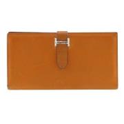 Pre-owned Leather wallets Hermès Vintage , Orange , Dames