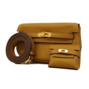 Pre-owned Leather shoulder-bags Hermès Vintage , Yellow , Dames