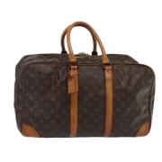 Pre-owned Canvas handbags Louis Vuitton Vintage , Brown , Dames