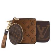 Pre-owned Leather clutches Louis Vuitton Vintage , Brown , Dames