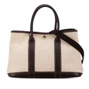 Pre-owned Canvas handbags Hermès Vintage , Beige , Dames