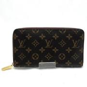 Pre-owned Canvas wallets Louis Vuitton Vintage , Brown , Dames