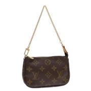 Pre-owned Canvas pouches Louis Vuitton Vintage , Brown , Dames