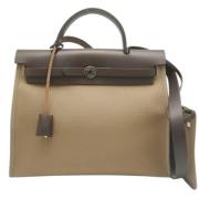 Pre-owned Canvas handbags Hermès Vintage , Brown , Dames