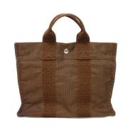 Pre-owned Canvas handbags Hermès Vintage , Brown , Dames