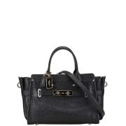 Pre-owned Leather handbags Coach Pre-owned , Black , Dames