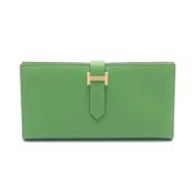 Pre-owned Leather wallets Hermès Vintage , Green , Dames