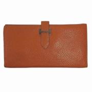 Pre-owned Leather wallets Hermès Vintage , Orange , Dames