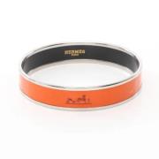 Pre-owned Stainless Steel bracelets Hermès Vintage , Orange , Dames