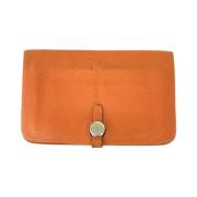 Pre-owned Leather wallets Hermès Vintage , Orange , Dames