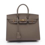 Pre-owned Leather handbags Hermès Vintage , Gray , Dames