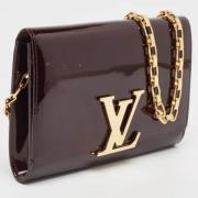 Pre-owned Leather clutches Louis Vuitton Vintage , Red , Dames