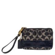 Pre-owned Leather clutches Coach Pre-owned , Black , Dames