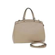 Pre-owned Leather handbags Louis Vuitton Vintage , Beige , Dames