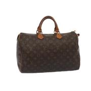 Pre-owned Canvas handbags Louis Vuitton Vintage , Brown , Dames