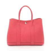 Pre-owned Leather handbags Hermès Vintage , Pink , Dames