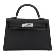 Pre-owned Leather handbags Hermès Vintage , Black , Dames