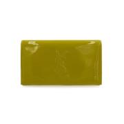 Pre-owned Leather clutches Yves Saint Laurent Vintage , Yellow , Dames