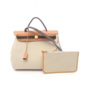 Pre-owned Fabric handbags Hermès Vintage , Beige , Dames