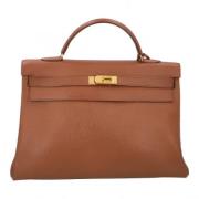 Pre-owned Leather handbags Hermès Vintage , Brown , Dames