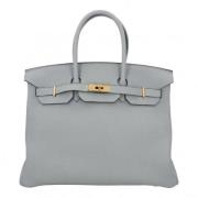 Pre-owned Leather handbags Hermès Vintage , Gray , Dames