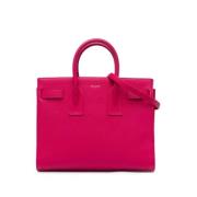 Pre-owned Leather handbags Yves Saint Laurent Vintage , Pink , Dames