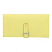 Pre-owned Fabric wallets Hermès Vintage , Yellow , Dames