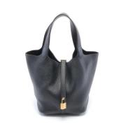 Pre-owned Leather handbags Hermès Vintage , Black , Dames